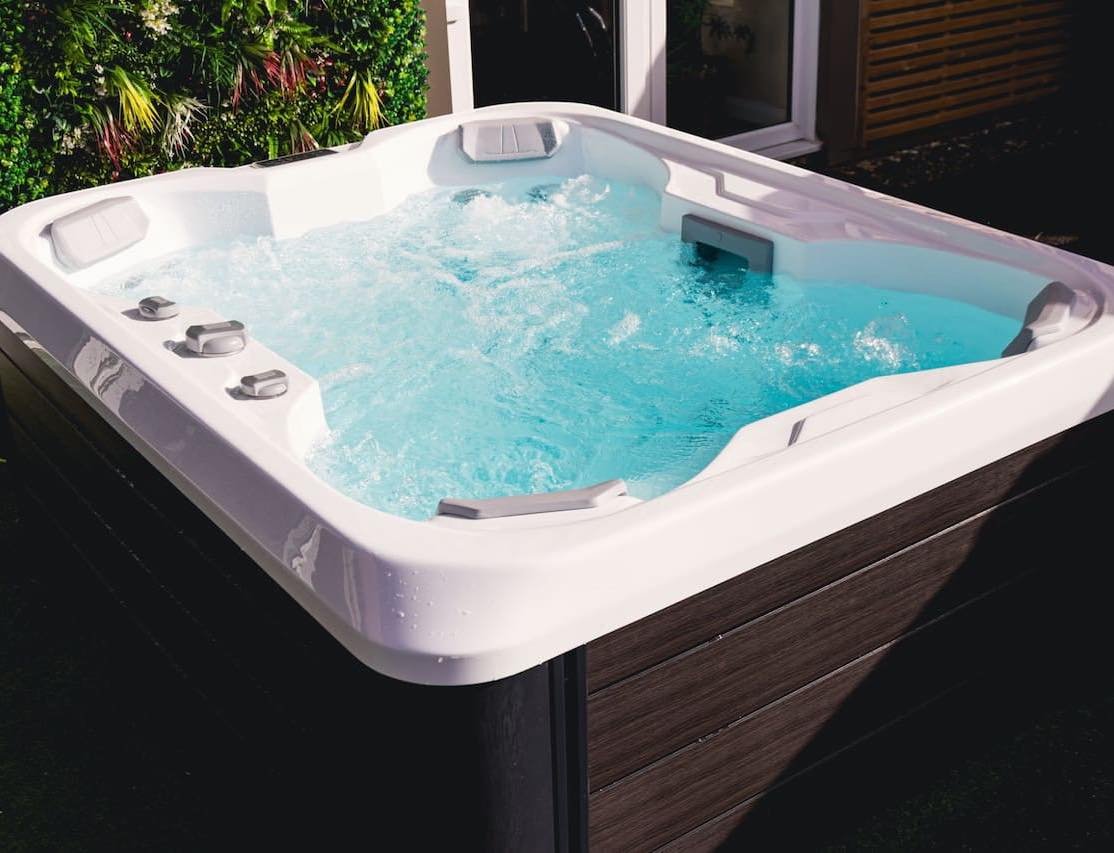 A high-performance hot tub with active jets following a professional technical service and deep clean.